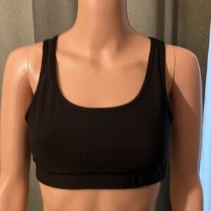 Black Crop Top
Size M
Back has 4 open straps